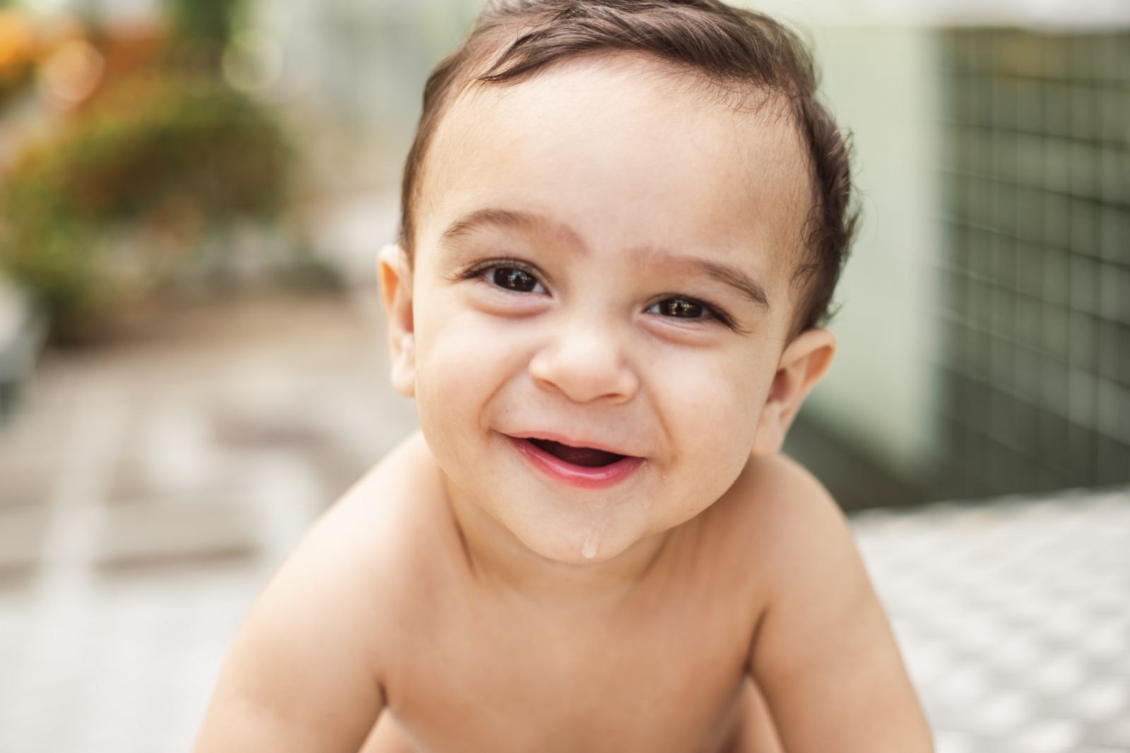 A baby drooling during the teething process