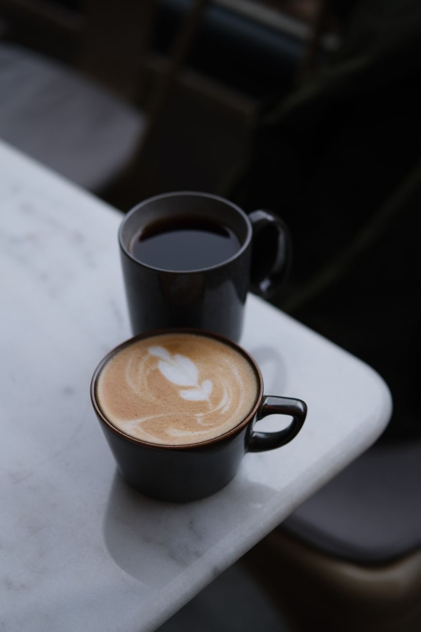 A cup of black coffee, which costs only a few milligrams of calcium per cup according to the Linus Pauling Institute