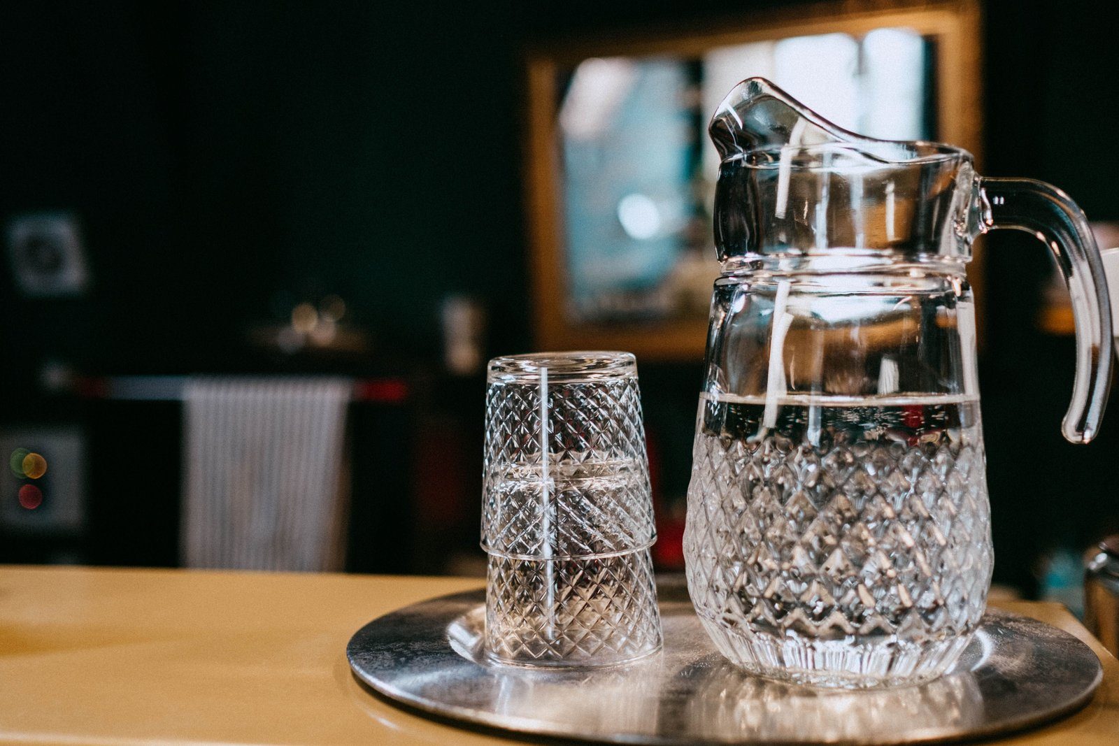A drop of water, a reminder that soluble fiber needs fluid to form the gel that softens stool