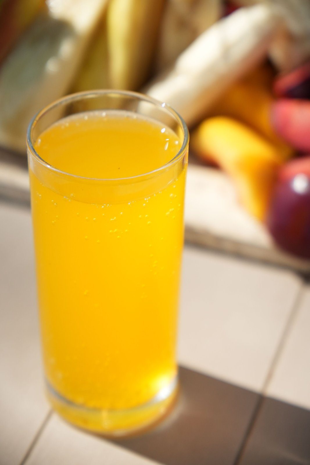 A glass of fruit juice, where fructose is metabolized almost entirely by the liver and converted straight into fat