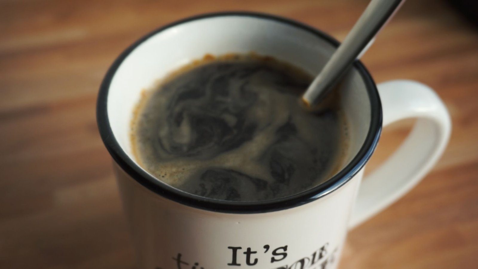 A mug of brewed coffee, about 100 mg of caffeine per cup